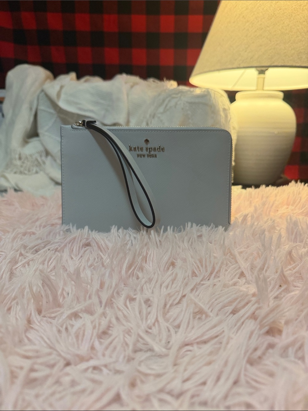 kate spade White Zip Wristlet with Black-Trim Strap